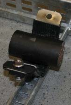 Install the cables, when necessary remove the removable bas pad to allow for the larger cables in the cleats range