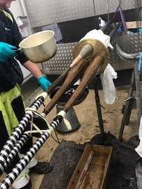 Basting with hot oil prior to taping