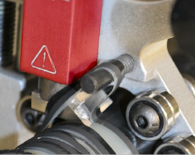 Winding pin keeps semi-con strip from getting in the way