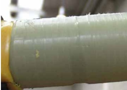 Figure 30 – Extremely Rough Insulation Surface Resulting from Incorrect Setting and/or Misuse of Screen Removal Tool Figure 30 – Extremely Rough Insulation Surface Resulting from Incorrect Setting and/or Misuse of Screen Removal Tool