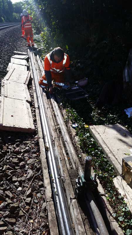 Blue Sky, Sunny Day - trackside cable identification underway on existing 33kV cables using a Lee Vaughan cable identifier and setting up of the Accles & Shelvoke spiking gun under a sanction for cable testing.