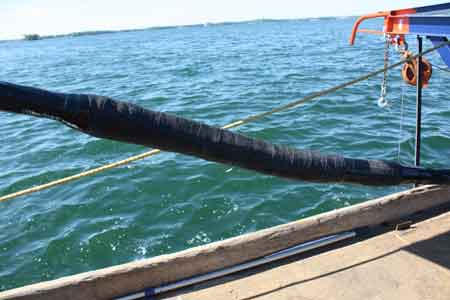 14. The entire 3M Cold Shrink cable splice is covered in three layers of 3M Armorcast, (installed wet and sets solid). Then all anchors are pulled, the barges stay attached and the cable barge travels the route, paying off the cable to the end of the reel.