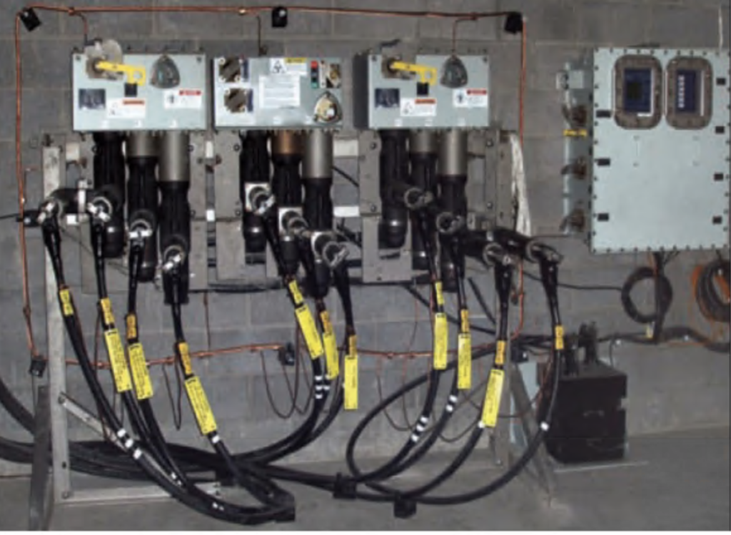 Three-way, solid dielectric, automatic transfer switch with submersible control cabinet and potential transformers.