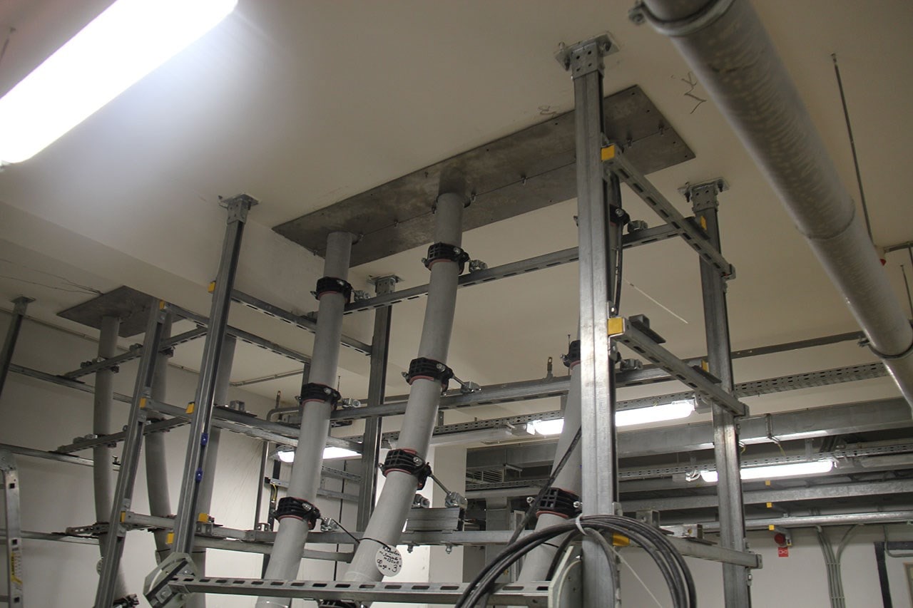 Flexible cable seals for gas insulated substations