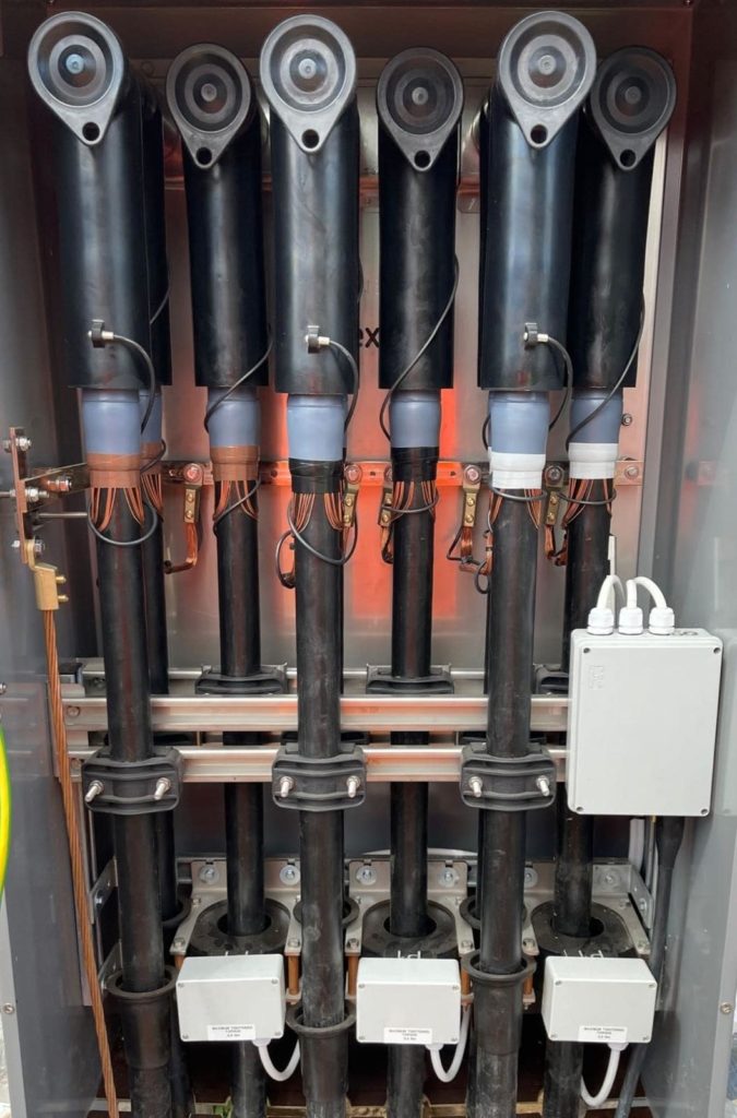 Configuration | the Interface C type connectors provide versatile and optional system design configurations. Here, our team of Jointers were deployed to "Piggy-back" the Euromolds into the medium voltage switchgear compartment.