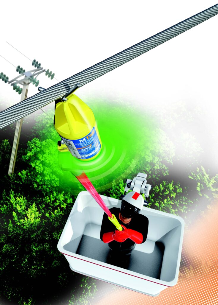 Engineer installs PENTA MTAG high voltage detector on overhead power line using hot stick Engineer installs PENTA MTAG high voltage detector on overhead power line using hot stick